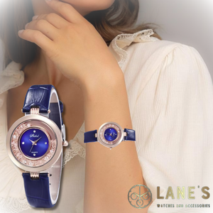 Blue Ladies watch with moving crystals in the centre and a smaller clock