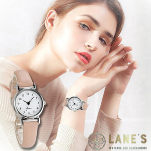 Perfectly Pink Ladies Watch featuring a pink strap, white face with black traditional numbers. 