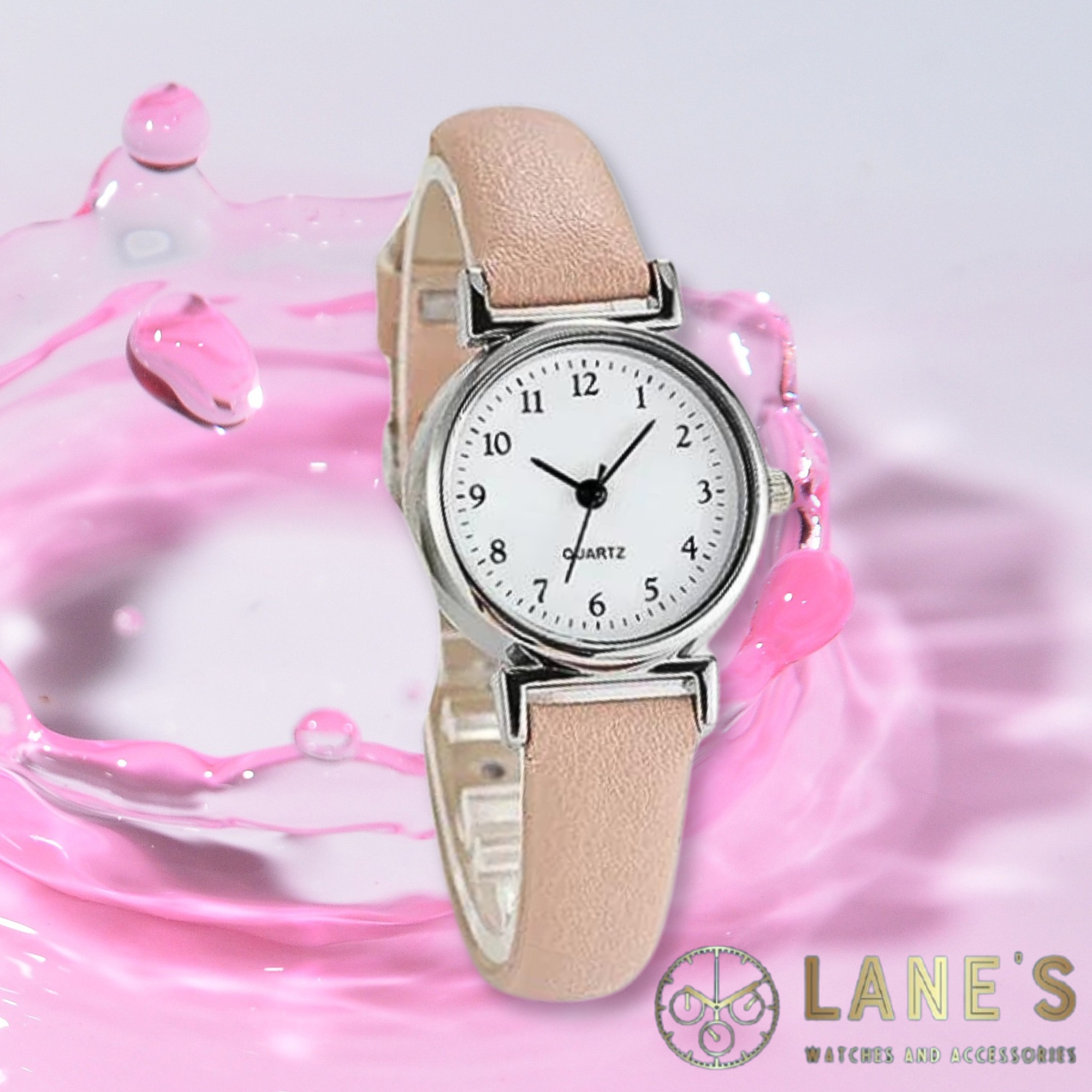 Perfectly Pink Ladies Watch featuring a pink strap, white face with black traditional numbers. 