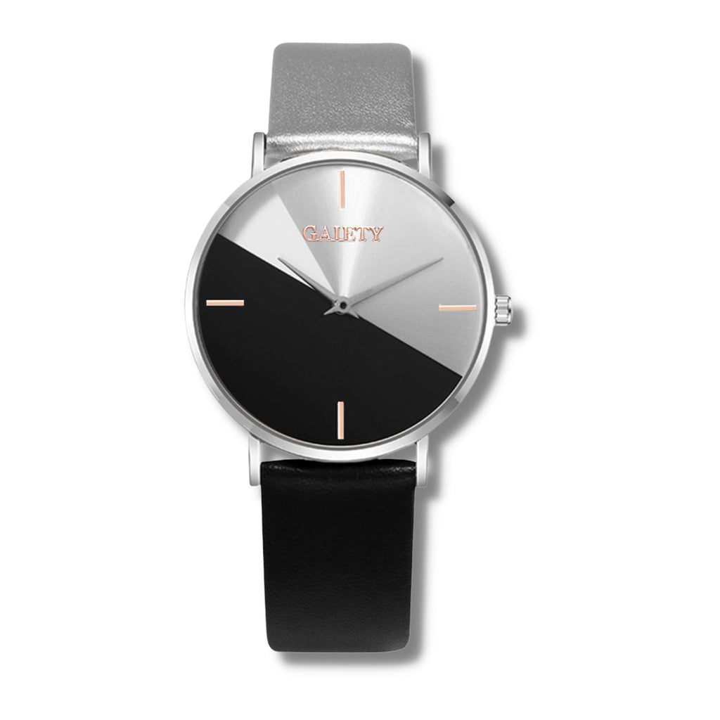 half black and half silver faced watch with 4 rose gold lines representing numbers with a silver trim and one black strap and one silver strap on a white background