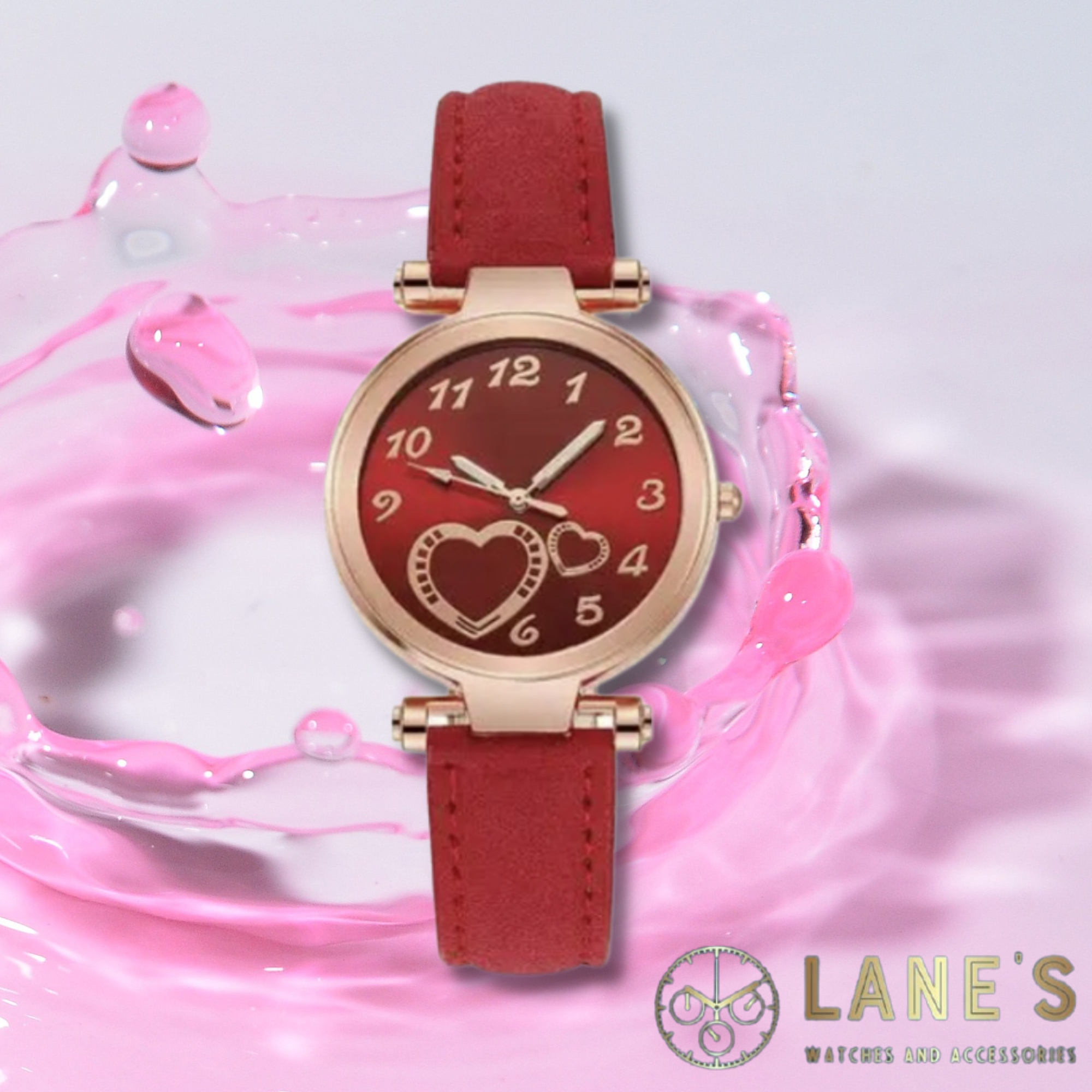 red faced watch with two gold hearts and gold numbers with a gold trim and a red faux leather strap on a pink background